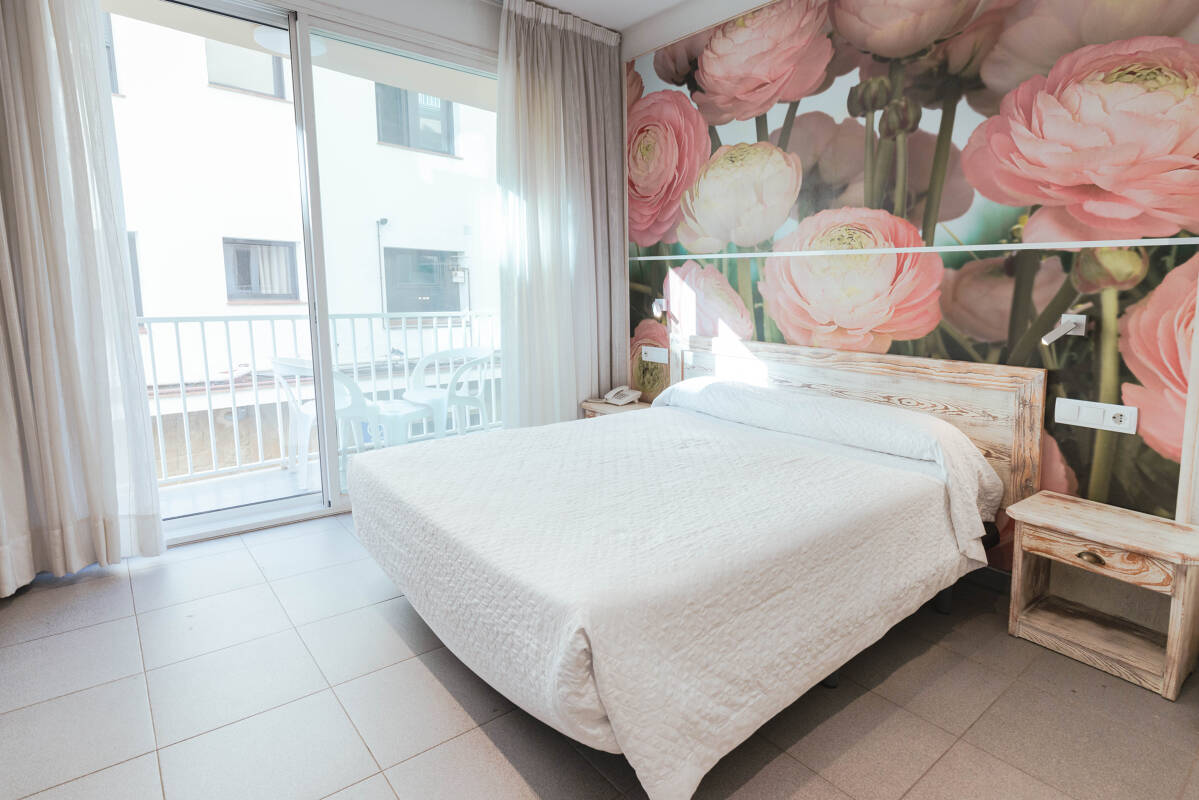 Doble amb balcó carrer lateral