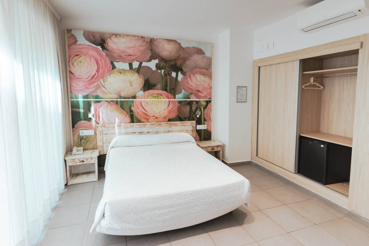 Doble amb balcó carrer lateral